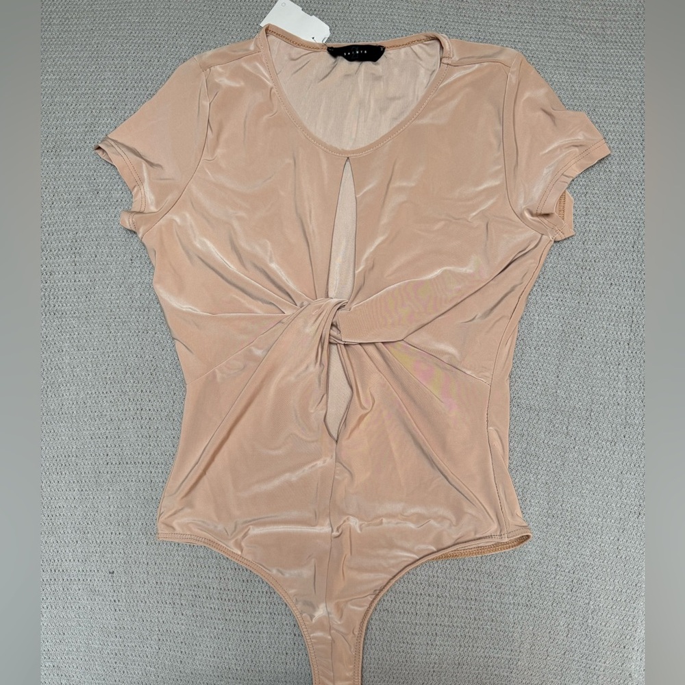 Cream body suit with front slits